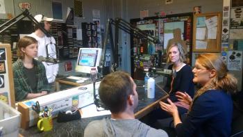 Michael Blum (Mechanical Engineering Student), Krista Jacobsen (Horticulture) and Helen Turner (Interior Design) discuss their work bringing food and design together at the Greg Page Shawneetown Community Garden with &quot;Green Talks&quot; host Ellen Green on Jan. 21, 2015. 